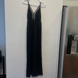 Black Windsor maxi dress. Size medium. Cut out squares around chest. Tie closure
